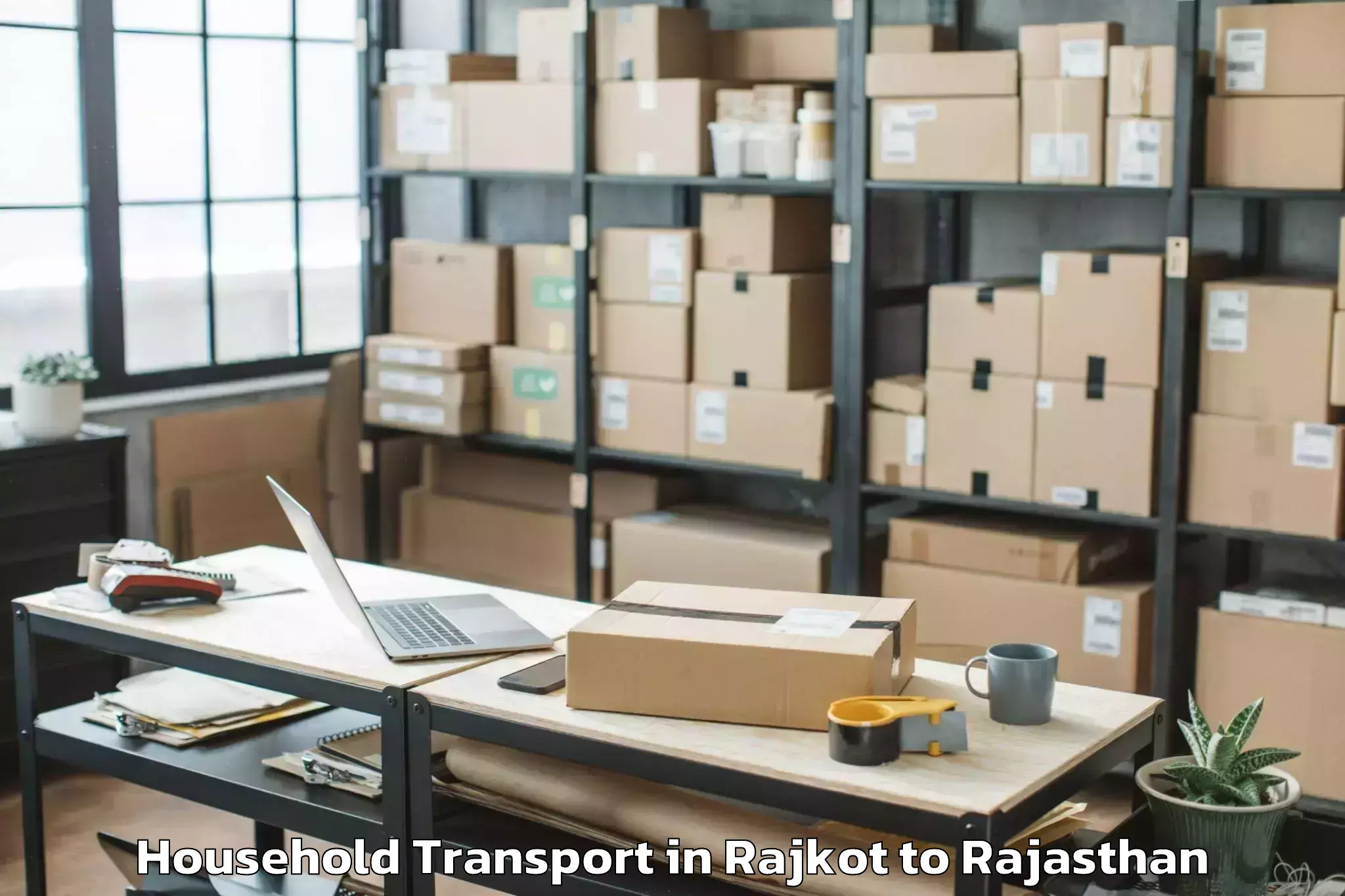 Professional Rajkot to Salumbar Household Transport